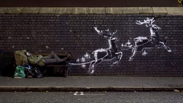 Dílo streetartového umělce Banksyho.