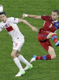 Poland&#039;s Robert Lewandowski, left,and Czech Republic&#039;s Michal Kadlec challenge for the ball during the Euro 2012 soccer championship Group A match between Czech Republic and Poland in Wroclaw, Poland, Saturday, June 16, 2012