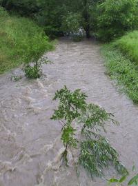 Rozvodněný potok (ilsutrační foto).
